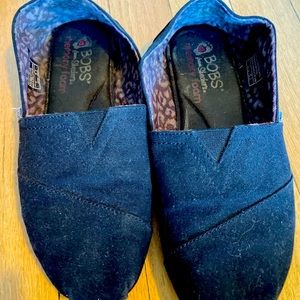 Will be donated 5/1 Black slip on memory foam Toms -like shoes